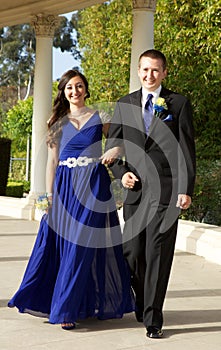 Teenage Couple Going to the Prom Walking and Smiling