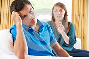 Teenage Couple Having Arguement At Home