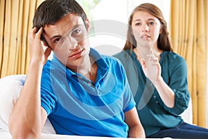 Teenage Couple Having Arguement At Home