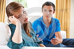 Teenage Couple Having Arguement At Home