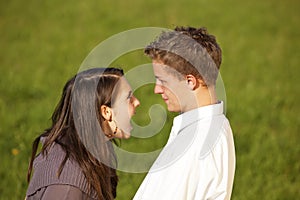 Teenage couple having a dispute photo