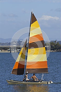 Teenage couple sailing