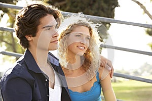 Teenage Couple Sitting On Steps