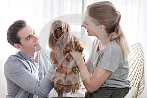 Teenage couples are having fun with their dogs