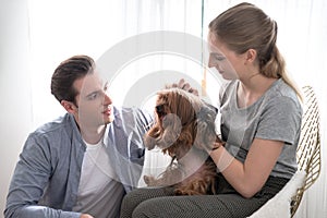 Teenage couples are having fun with their dogs