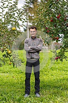 Teenage farmer in the orchard