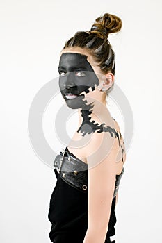 Teenage fashion girl painted black face