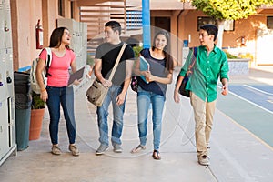 Teenage friends in a hallway