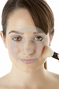 Teenage Girl Applying Make Up