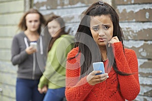 Teenage Girl Being Bullied By Text Message