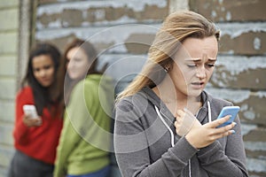 Teenage Girl Being Bullied By Text Message