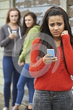 Teenage Girl Being Bullied By Text Message