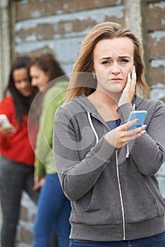 Teenage Girl Being Bullied By Text Message