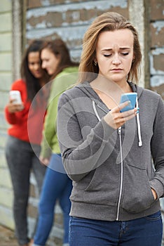 Teenage Girl Being Bullied By Text Message