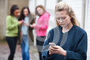 Teenage Girl Being Bullied By Text Message