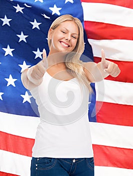 Teenage girl in blank white t-shirt with thumbs up