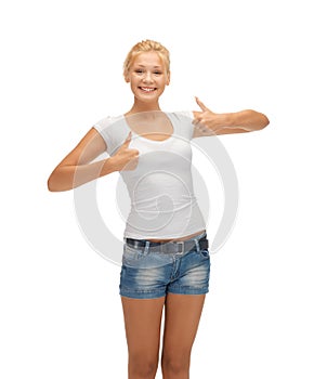 Teenage girl in blank white t-shirt with thumbs up