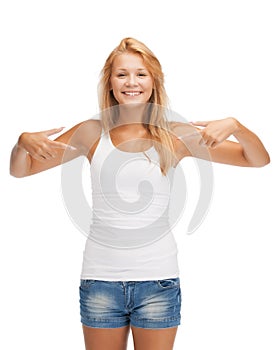 Teenage girl in blank white t-shirt with thumbs up