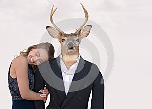 Teenage girl with buck in tuxedo