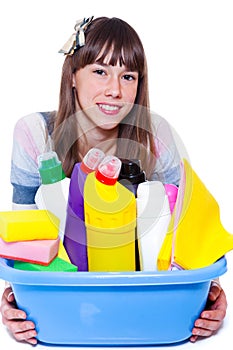 Teenage girl with cleaning agents