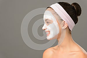 Teenage girl cosmetics mask beauty looking away