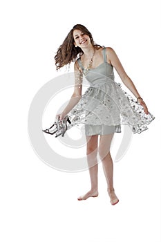 Teenage girl dances in lace party dress