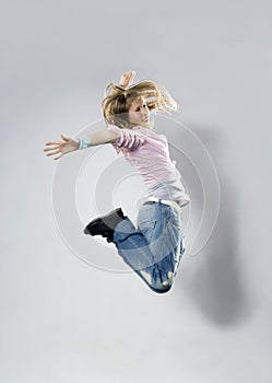 Teenage girl dancing breakdance