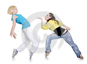 Teenage girl dancing over white background