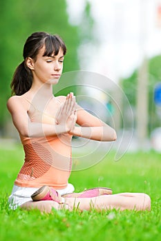 Teenage girl doing yoga exercise