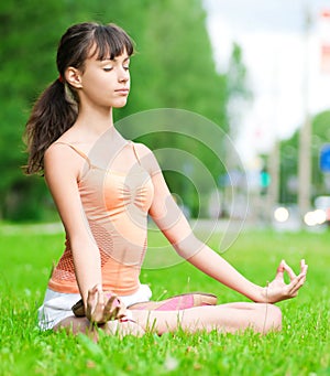 Teenage girl doing yoga exercise