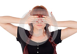 Teenage girl dressed in black with a piercing covering her eyes