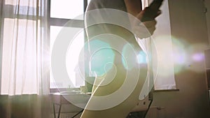 teenage girl exercising with jump rope at home