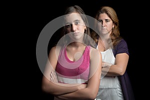 Teenage girl and her mother sad and angry