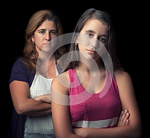 Teenage girl and her mother sad and angry