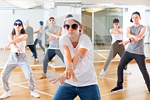 Teenage girl hip hop dancer during class