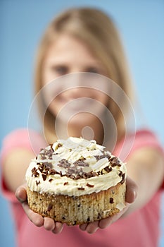 Teenage Girl Holding Cream Cake