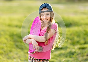 teenage girl holding her pink board