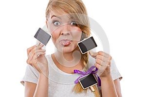 Teenage girl holding little school blackboards