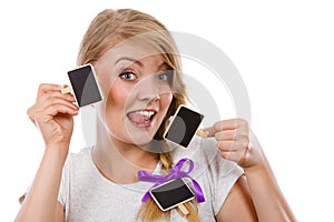 Teenage girl holding little school blackboards