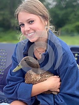 Teenage Girl Holding A Pet Duck