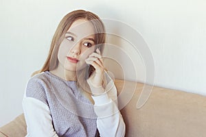 Teenage girl holding the phone