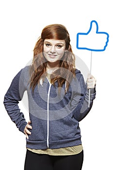 Teenage girl holding a social media sign smiling