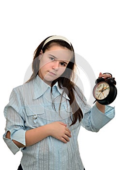 Teenage girl holds in his hand clock