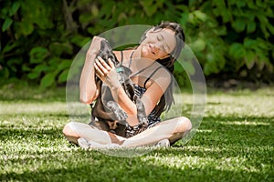 Teenage girl with Labrador puppy outside