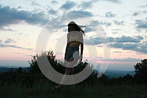 Teenage girl in late evening light