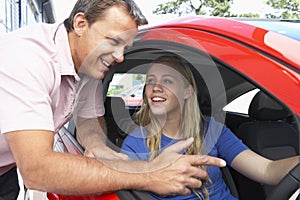 Teenage Girl Learning How To Drive