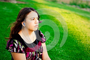 Teenage girl listening to music