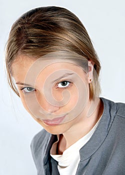 Teenage girl looking upward business attire