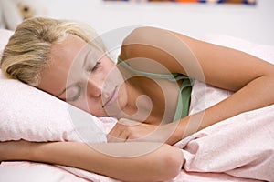 Teenage Girl Lying On Her Bed