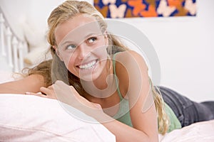 Teenage Girl Lying On Her Bed